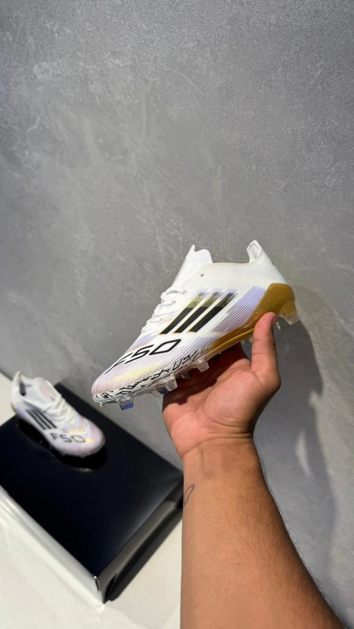 ADIDAS GUAYO F50 NIÑO DORADO - Image 8